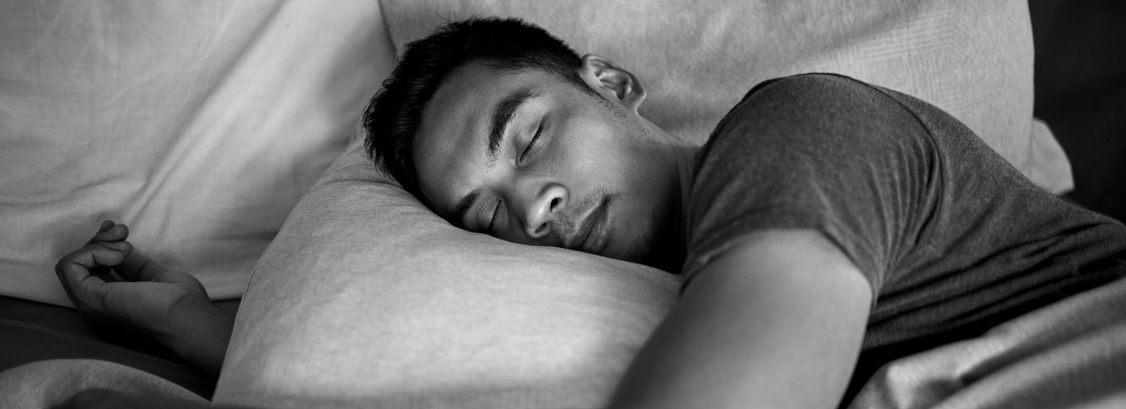 A man peacefully sleeping in a deep sleep