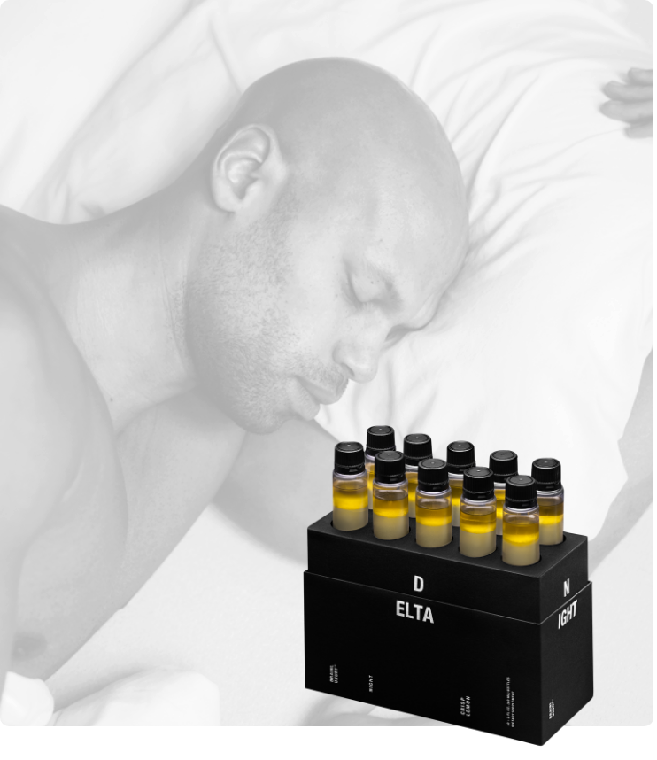 Man sleeping soundly in background with 10 box of DELTA BrainLuxury in foreground